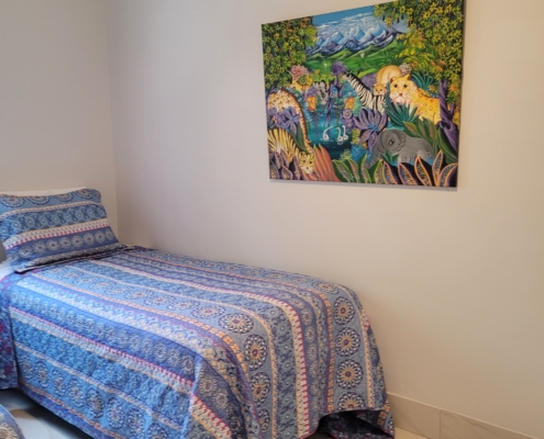 Twin bed room (art on the wall) at ProvoVilla