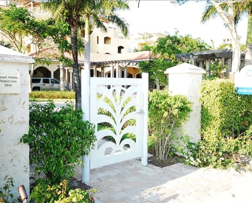 Gate entrance to Grace Bay Club where we access the Beach, just a 2 minute walk | French Riviera (2nd floor condo)